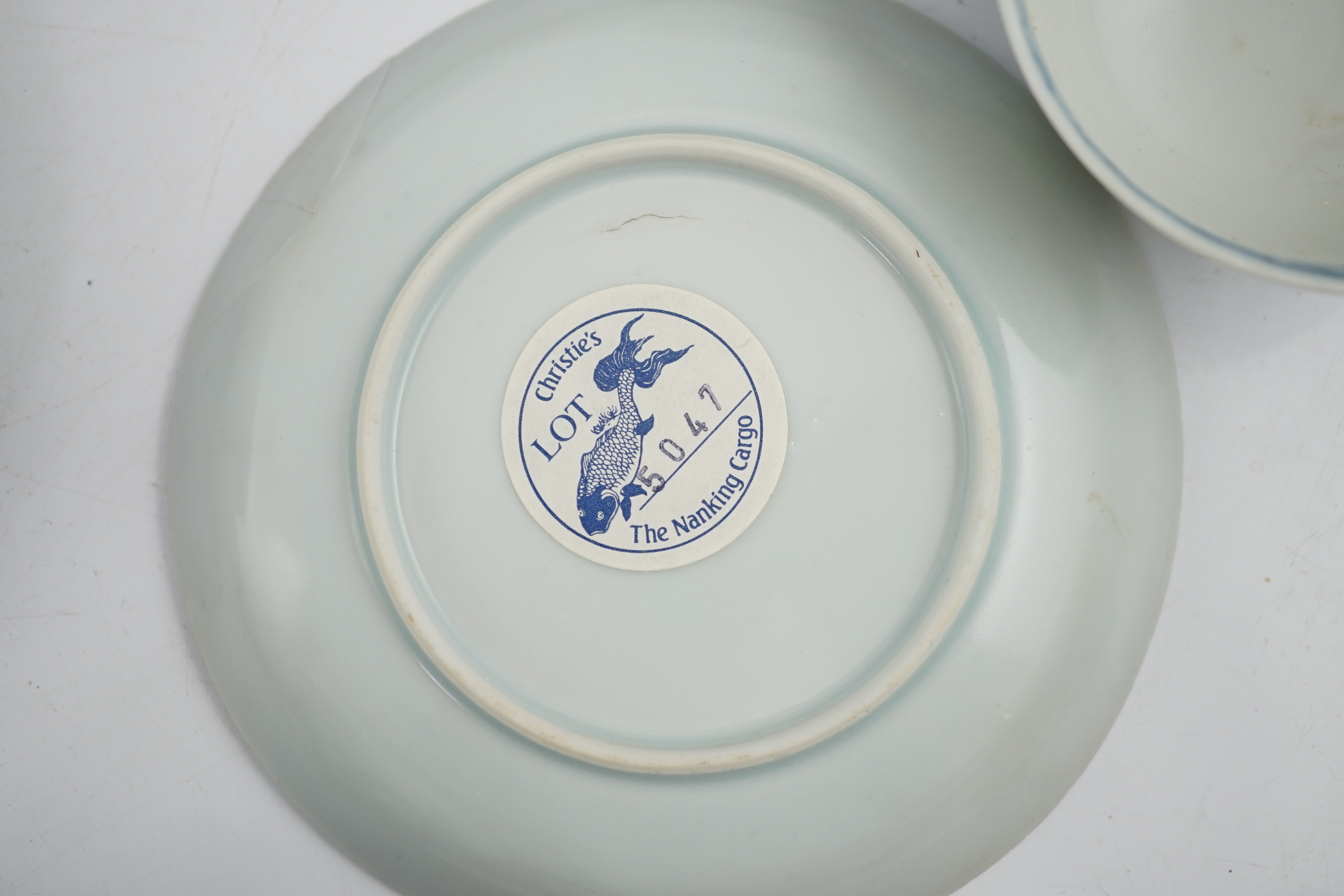 A set of twenty four Chinese Nanking Cargo blue and white ‘large pagoda’ tea bowls and saucers, Qianlong period